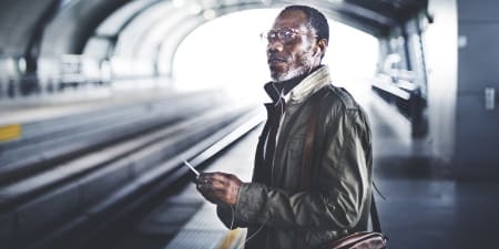 Man standing in subway